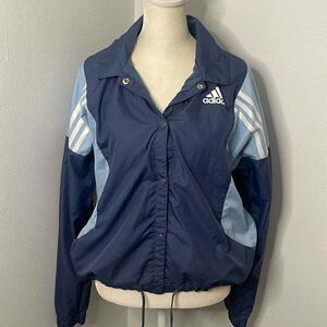 Adidas wind breaker running jacket. Size Medium. Drawstring. Snap closure.